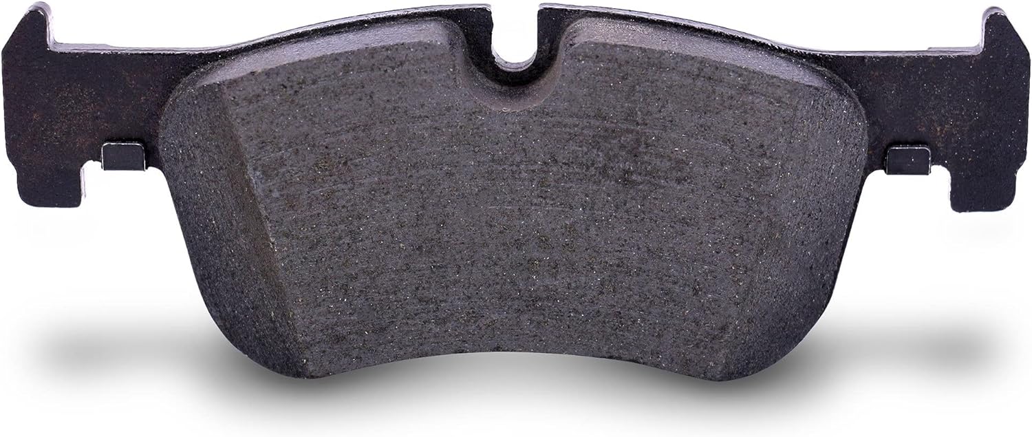Close-up of a ceramic brake pad's fine, dense friction material